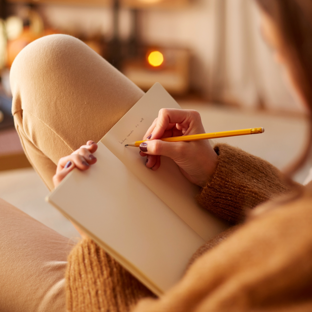 A woman writing a note