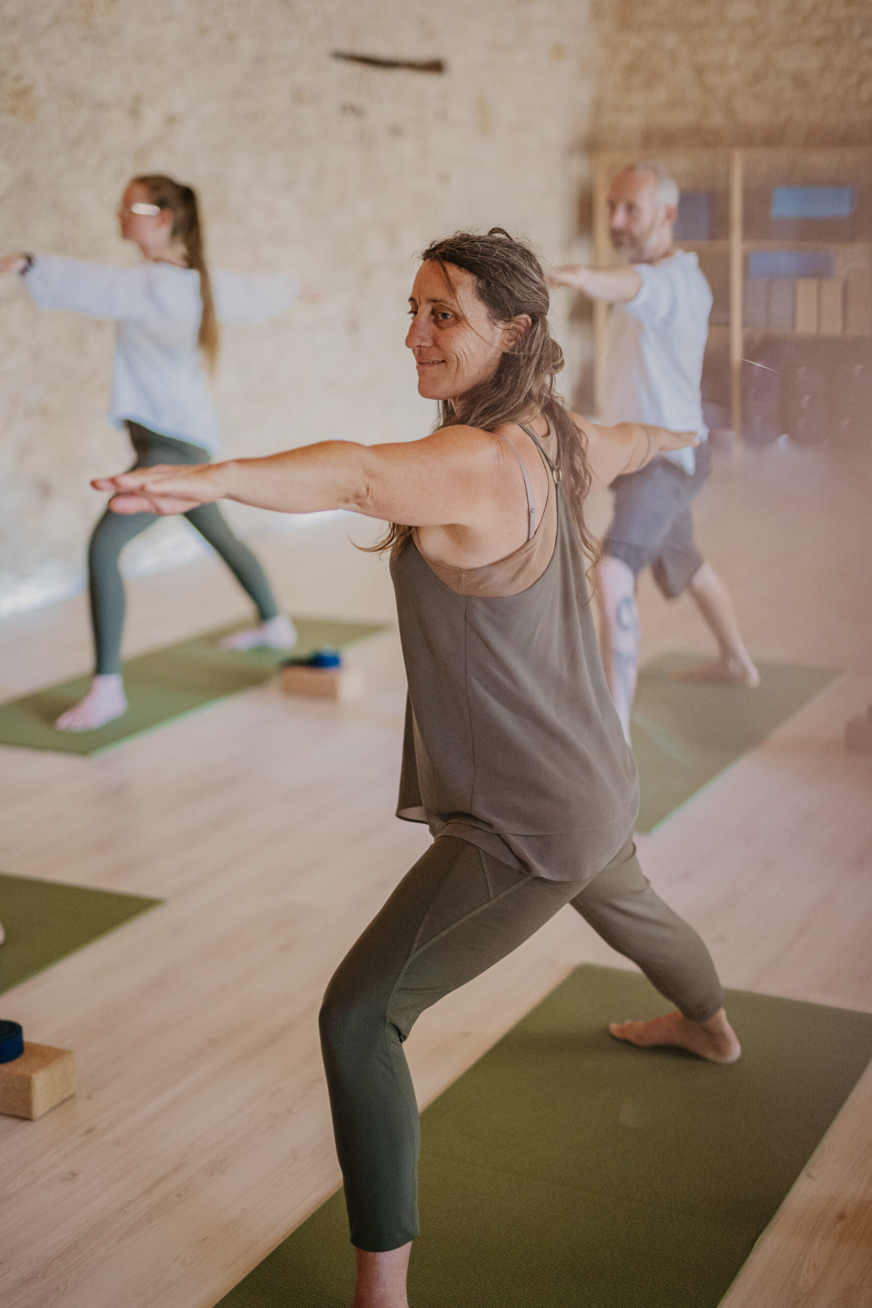 group of people doing yoga pose